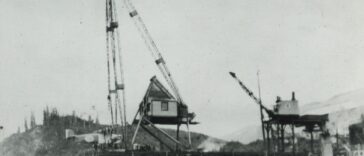 View of one of the Douglas World Cruiser aircraft being hoisted out of the water for repairs at Prince Rupert, BC, in April 1924.
